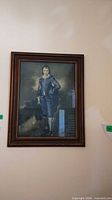 Full view of framed 'Blue Boy' print on wall