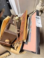 Box containing clock radio, prints and mirror
