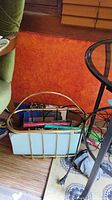 Magazine rack with books and cords