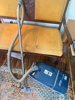 Overall view of Kenmore 6920 canister vacuum with hose, wand and floor head