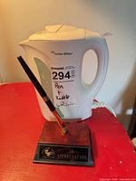 Kettle and desk pen plaque together
