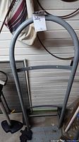 Front view of grey steel hand truck
