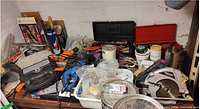 Workbench with power tools, hand tools, paint, storage cases