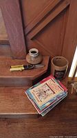 Overall lot showing magazines, small vase, shears, Roto crock