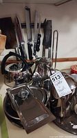 overview of stainless kettle, teapots, coffee pot, creamer, sugar, lidded dish, tray