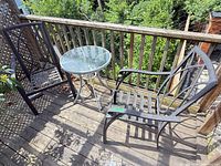 Full bistro set on deck: two chairs and table