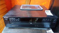 Front and top view of Sony CDP-C235 showing overall condition