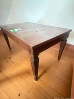 Full view of coffee table showing shape and legs