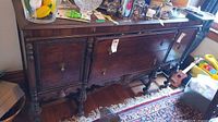 Full view of front of sideboard with drawers and cabinet doors