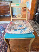 Full view of chair front with cushion and seat