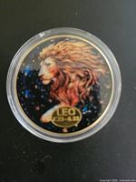 Obverse view showing enamel Leo lion design