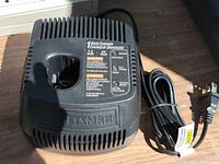 Top view of Craftsman charger showing battery slot, label and power cord