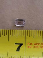 Gemstone beside ruler showing size about 6 mm