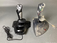 Overall shot of both joysticks with cables visible