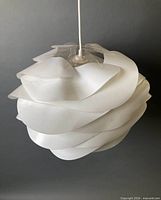 Lamp assembled showing layered white shade