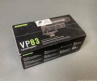 Sealed retail box front showing Shure VP83 LensHopper model