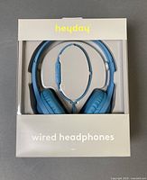 Front of sealed Heyday wired blue headphones box showing product