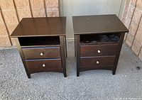 Both nightstands front view showing drawers and shelf