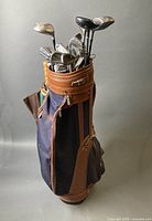 Full view of golf bag with clubs