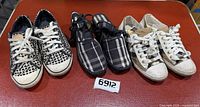 All three pairs of footwear displayed side by side