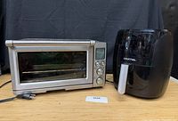 Breville toaster oven and Gourmia air fryer side by side on tabletop