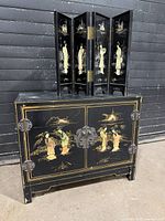 Cabinet and folding screen front view showing design and inlay