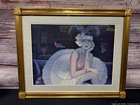Front view of framed Peltiaux print under glass