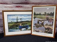Two framed prints side by side