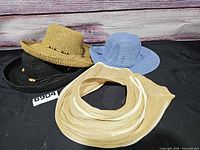 Group shot of all four sun hats