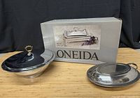 Lot overview showing both covered dishes and original Oneida box