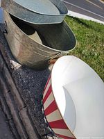 Three metal serving pieces: patriotic tub, galvanized tub, galvanized tray