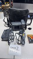 Full lot with camcorder, case, adapter, cable, tape