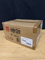 Sealed Tripp Lite shipping box showing brand markings