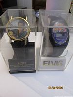 Analog and digital Elvis watches side by side in clear cases