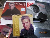 Three Elvis Presley calendars: two boxed, one spiral-bound