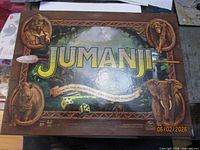 Top of Jumanji game box with logo and artwork