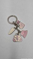 Full view of keychain with all five charms visible