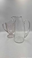 Front view of both pitchers side by side