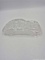 side view of clear crystal Porsche 911 model car