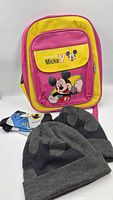 Front view Mickey Mouse backpack, Batman hat and socks