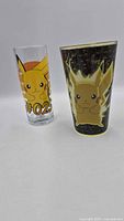 Both Pikachu tumblers side by side front view