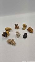 All eight Wade porcelain animal figurines group view