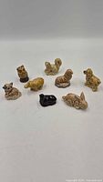 Group view of all eight Wade animal figurines