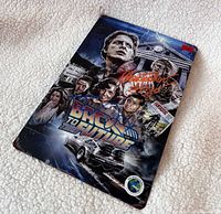 Front view of autographed photo showing entire artwork and authentication sticker