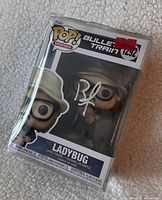 Front view of boxed Funko Pop showing autograph and hologram