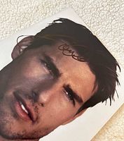 Front view of signed photograph showing signature placement