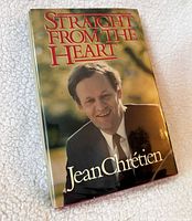 Front view of dust-jacketed signed book