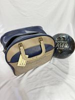 Bowling ball and carrying bag full view