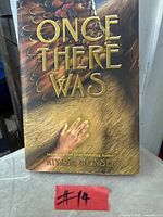Front cover of Once There Was trade paperback showing title, author, and artwork
