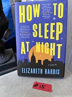Front cover of hardcover book showing title, author, and condition
